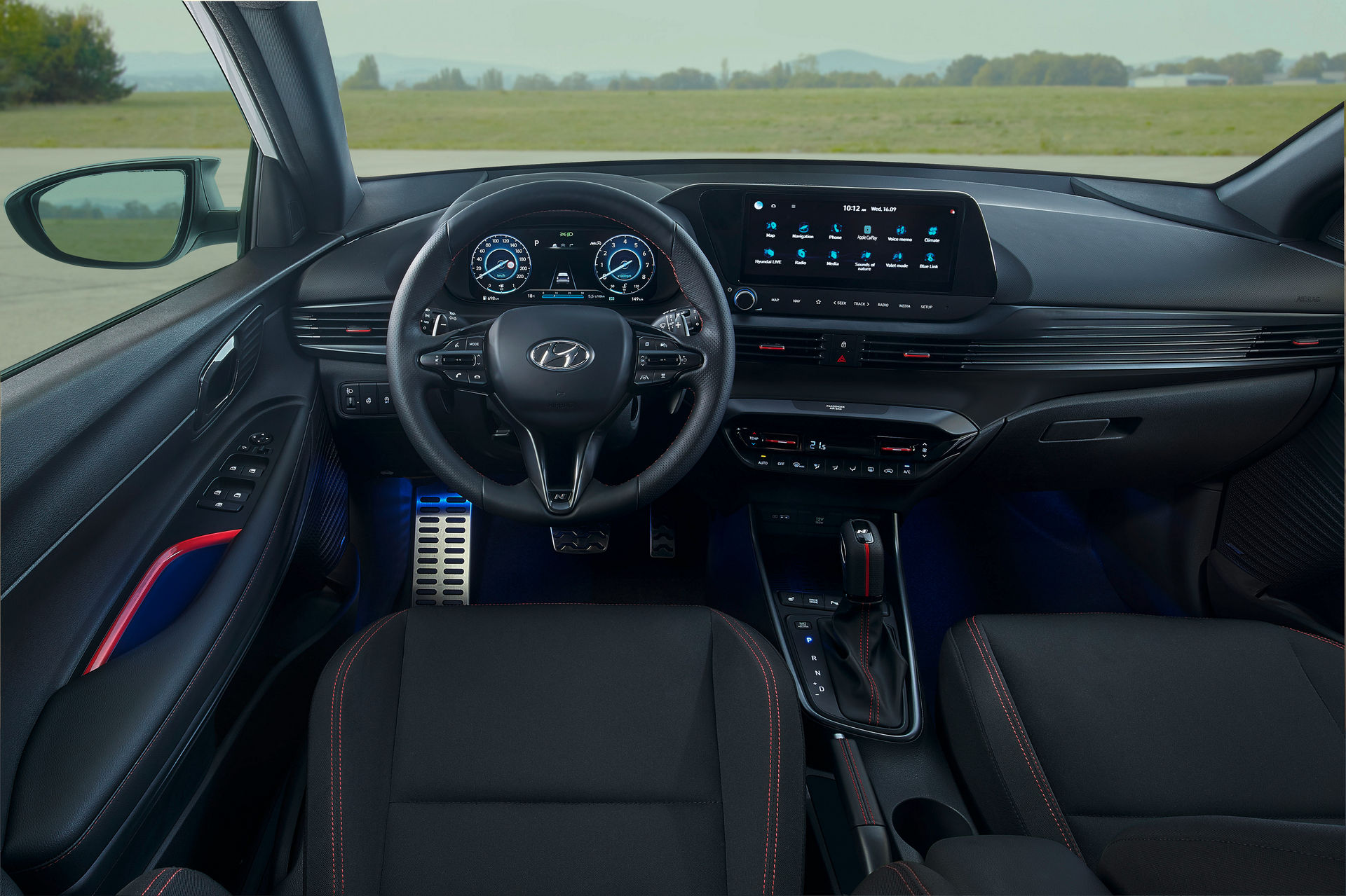 All-black interior with new 3-spoke steering wheel